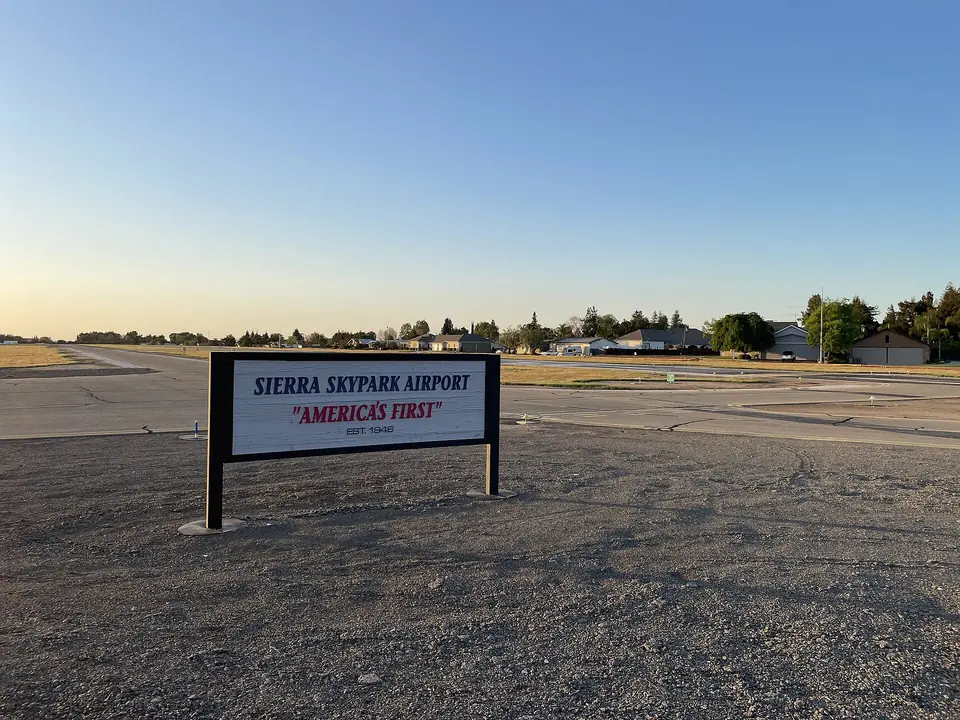 The Sierra Sky Park airport sign beside the runway area