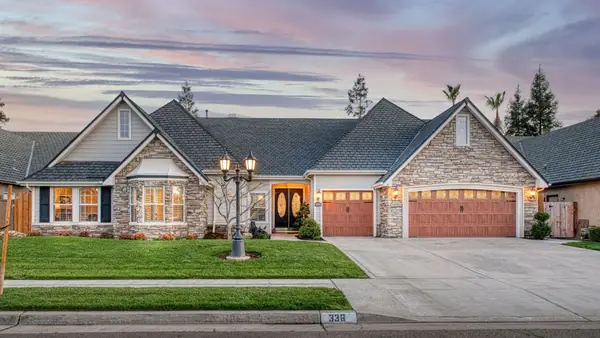Twilight photo of a home on W Warwick Ave, Clovis